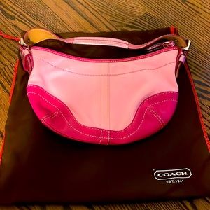 Pink coach shoulder bag with duster
